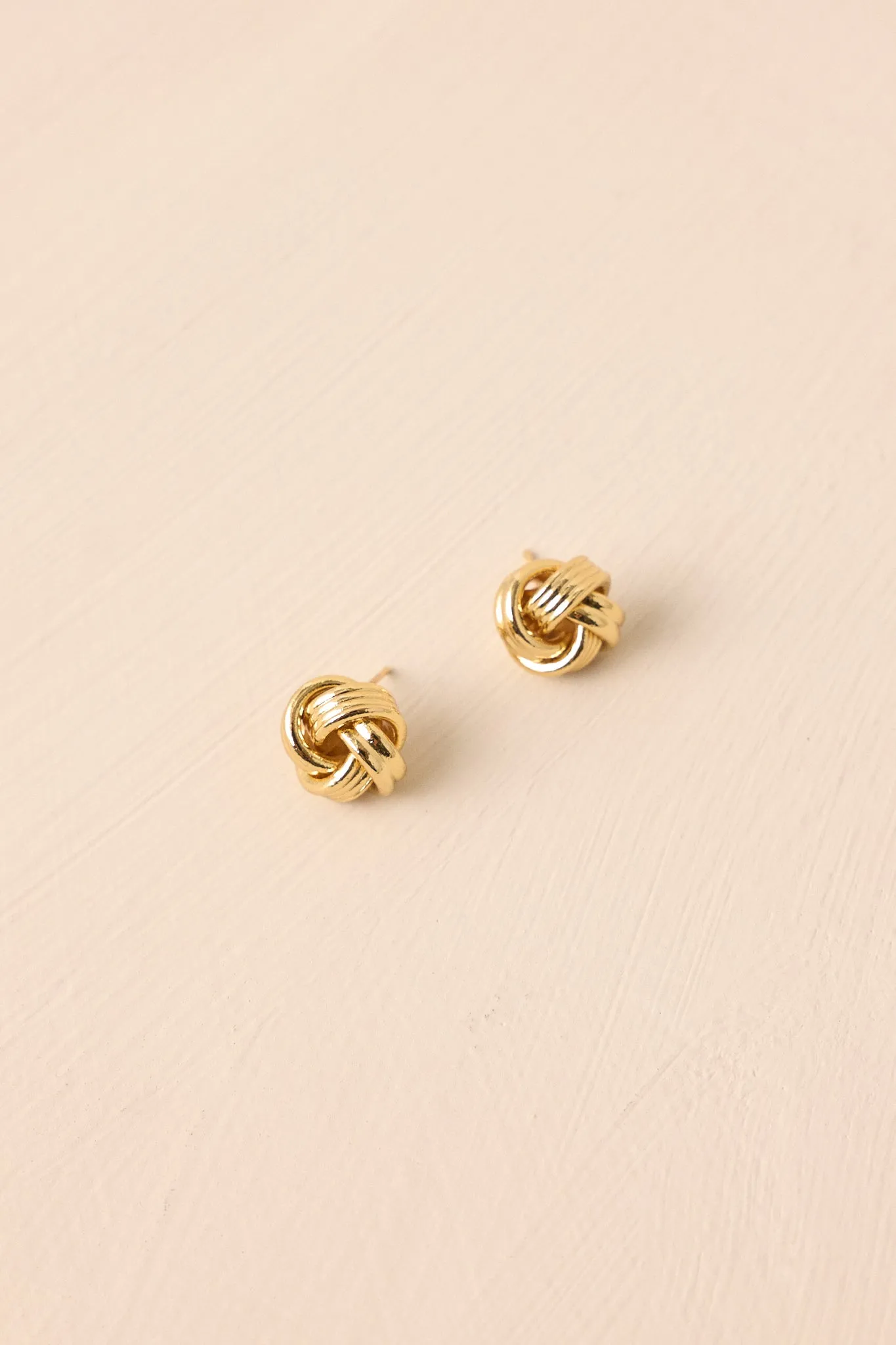 Always Independent Gold Knot Stud Earrings