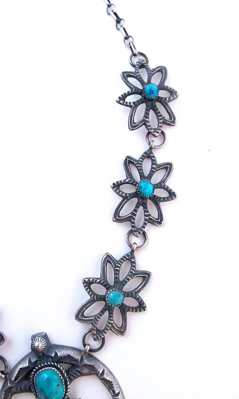 KEVIN BILLAH Sandcast Sterling Silver and Kingman Turquoise Naja Squash Blossom