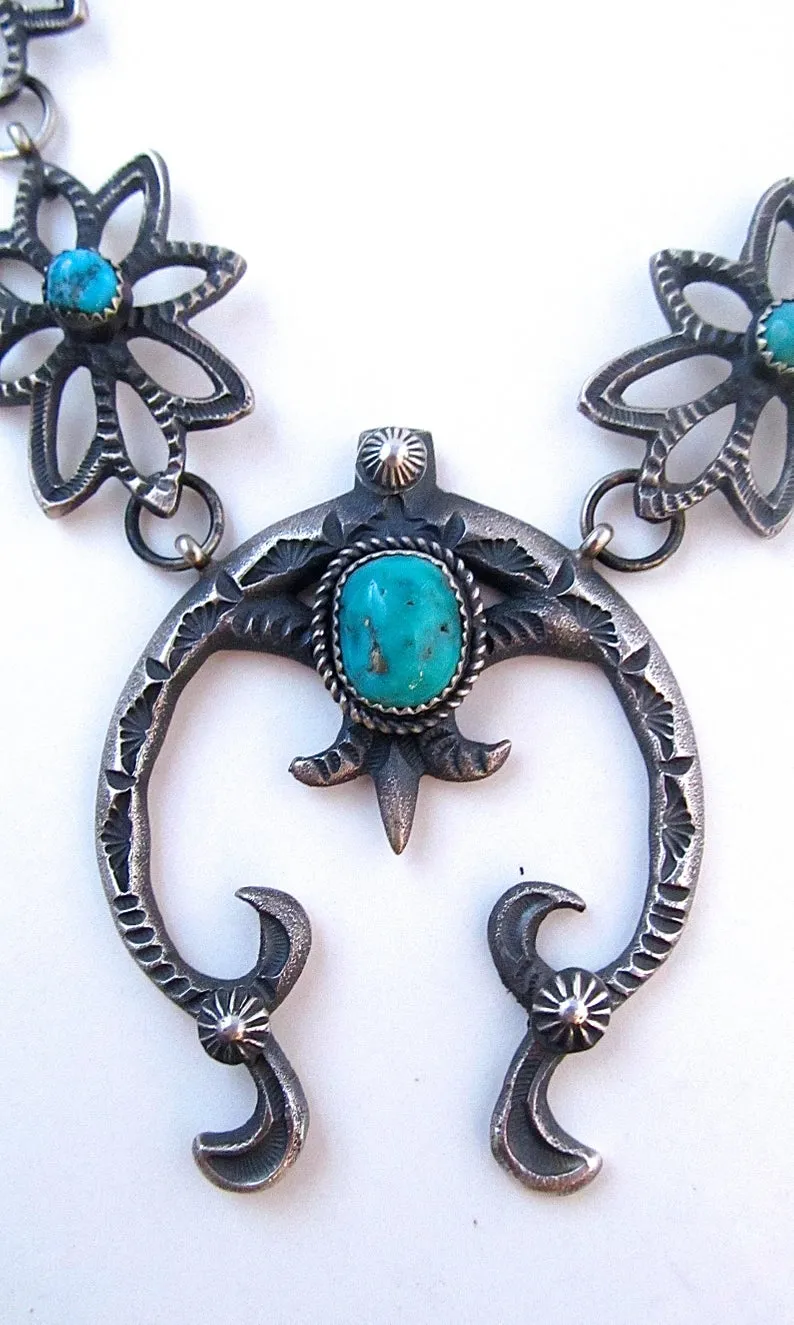 KEVIN BILLAH Sandcast Sterling Silver and Kingman Turquoise Naja Squash Blossom